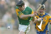 15 February 2004; Gregory O'Kane, Dunloy, in action against Eugene McEntee, Portumna. AIB All-Ireland Club Senior Hurling Championship Semi-Final, Portumna v Dunloy, St. Tighernach's Park, Clones, Co. Monaghan. Picture credit; David Maher / SPORTSFILE *EDI*
