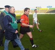 15 February 2004; Referee Seamus Roche leaves the field at the end of the game. AIB All-Ireland Club Senior Hurling Championship Semi-Final, Newtownshandrum v O'Loughlin Gaels, Semple Stadium, Thurles, Co. Tipperary. Picture credit; Damien Eagers / SPORTSFILE *EDI*