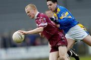8 February 2004; James Conroy, Westmeath, in action against Longford's Arthur O'Connor. Allianz National Football League, Division 1A, Westmeath v Longford, Cusack Park, Mullingar, Co. Westmeath. Picture credit; Damien Eagers / SPORTSFILE *EDI*