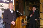 18 February 2004; An Taoiseach Bertie Ahern T.D. listens to Paidi O Se at the launch of the Paidi O Se Football Weekend. The Burlington Hotel, Dublin. Picture credit; Brian Lawless / SPORTSFILE *EDI*