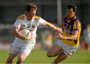 13 July 2013; Sean McCormack, Longford, in action against Graeme Molloy, Wexford. GAA Football All-Ireland Senior Championship, Round 2, Longford v Wexford, Glennon Brothers Pearse Park, Longford. Picture credit: Matt Browne / SPORTSFILE