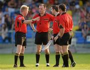 13 July 2013; Referee Padraig O'Sullivan, second from left, and his officals, from left, linesman Ciaran Branagan and Noel Mooney with sideline official Fergal Barry. GAA Football All-Ireland Senior Championship, Round 2, Longford v Wexford, Glennon Brothers Pearse Park, Longford. Picture credit: Matt Browne / SPORTSFILE