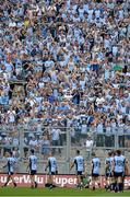 14 July 2013; Dublin players make their way past the supporters on Hill 16 during the parade. Leinster GAA Football Senior Championship Final, Meath v Dublin, Croke Park, Dublin. Picture credit: Matt Browne / SPORTSFILE
