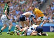14 July 2013; Paul Mannion, Dublin, has his jersey pulled by Paddy O'Rourke, Meath as his team-mate James McCarthy tusseles with Seamus Kenny. Leinster GAA Football Senior Championship Final, Meath v Dublin, Croke Park, Dublin. Picture credit: Barry Cregg / SPORTSFILE