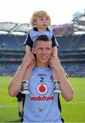 14 July 2013; Darren Daly, Dublin, celebrates with his son Caolán, age 2, after the game. Leinster GAA Football Senior Championship Final, Meath v Dublin, Croke Park, Dublin. Picture credit: Barry Cregg / SPORTSFILE