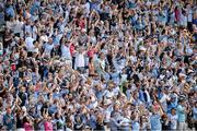 14 July 2013; Dublin supporters celebrate a score. Leinster GAA Football Senior Championship Final, Meath v Dublin, Croke Park, Dublin. Picture credit: Brian Lawless / SPORTSFILE