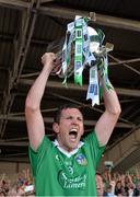 14 July 2013; Limerick captain Donal O'Grady lifts the cup after victory over Cork. Munster GAA Hurling Senior Championship Final, Limerick v Cork, Gaelic Grounds, Limerick. Picture credit: Diarmuid Greene / SPORTSFILE
