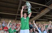 14 July 2013; Limerick captain Donal O'Grady lifts the cup after victory over Cork. Munster GAA Hurling Senior Championship Final, Limerick v Cork, Gaelic Grounds, Limerick. Picture credit: Diarmuid Greene / SPORTSFILE