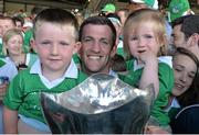 14 July 2013; Limerick captain Donal O'Grady holds the cup, along with his children, Danny, aged 3 and a half, and Anna, aged 2, after victory over Cork. Munster GAA Hurling Senior Championship Final, Limerick v Cork, Gaelic Grounds, Limerick. Picture credit: Diarmuid Greene / SPORTSFILE