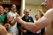14 July 2013; Limerick manager John Allen is congratulated by Stephen Walsh, Nickie Quaid and Wayne McNamara as he enters the winning dressing room. Munster GAA Hurling Senior Championship Final, Limerick v Cork, Gaelic Grounds, Limerick. Picture credit: Ray McManus / SPORTSFILE