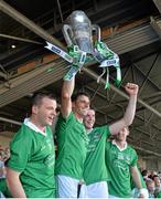 14 July 2013; Limerick players, from left, Alan Dempsey, David Breen, Declan Hannon and Thomas Ryan celebrate with the cup after victory over Cork. Munster GAA Hurling Senior Championship Final, Limerick v Cork, Gaelic Grounds, Limerick. Picture credit: Diarmuid Greene / SPORTSFILE
