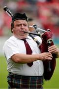 14 July 2013; Phillip Doran plays the bagpipes in the Tulla Pipe Band. Munster GAA Hurling Senior Championship Final, Limerick v Cork, Gaelic Grounds, Limerick. Picture credit: Ray McManus / SPORTSFILE