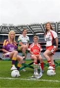 15 July 2013; Pictured at the launch are junior players, from left to right, Kellie Kearney, Wexford, Siobhan Flannery, Offaly, Grace Lynch, Louth, and Ashelene Groogan, Derry. September 29th will be the 40th time that the final of the Senior Ladies Gaelic Football Final will be contested. The first final took place in October 1974 and was contested by Tipperary and Offaly in a game that was won by the Tipperary women. The most successful team in the history of the game are Kerry who have won the title on 11 occasions including an unprecedented 9-in-a-row. In recent years Cork have been the dominant force winning 7 of the last 8 titles. TG4 made the announcement that RefCam will be introduced to Irish Sport for the first time. The lightweight head mounted device will be a feature of TG4’s live coverage of the 2013 Ladies Football Championship and will provide viewers with unique insight into the game but it will also be a hugely valuable coaching resource for referees. 2013 TG4 All-Ireland Ladies Football Championship Launch, Croke Park, Dublin. Picture credit: David Maher / SPORTSFILE