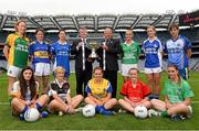 15 July 2013; Pictured at the launch are Pol O Gallchoir, Ceannsaí TG4, and Pat Quill, President of the Ladies Gaelic Football Association, with intermediate players, from left, Deirdre Ward, Leitrim, Lucy Mulhall, Wicklow, Anne O'Dwyer, Tipperary, Etna Flanagan, Sligo, Michelle McGrath, Waterford, Niamh Warde, Roscommon, Tara Little, Fermanagh, Sinead Fegan, Down, Donna English, Cavan, Emma McGuire, Limerick, and Sharon Tracey, Longford. September 29th will be the 40th time that the final of the Senior Ladies Gaelic Football Final will be contested. The first final took place in October 1974 and was contested by Tipperary and Offaly in a game that was won by the Tipperary women. The most successful team in the history of the game are Kerry who have won the title on 11 occasions including an unprecedented 9-in-a-row. In recent years Cork have been the dominant force winning 7 of the last 8 titles. TG4 made the announcement that RefCam will be introduced to Irish Sport for the first time. The lightweight head mounted device will be a feature of TG4’s live coverage of the 2013 Ladies Football Championship and will provide viewers with unique insight into the game but it will also be a hugely valuable coaching resource for referees. 2013 TG4 All-Ireland Ladies Football Championship Launch, Croke Park, Dublin. Picture credit: David Maher / SPORTSFILE