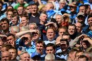 30 June 2013; Dublin supporters shield their eyes from the sun during the game. Leinster GAA Football Senior Championship, Semi-Final, Kildare v Dublin, Croke Park, Dublin. Picture credit: Ray McManus / SPORTSFILEPicture credit: Ray McManus / SPORTSFILE