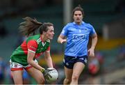 12 June 2021; Tamara O'Connor of Mayo passes as Niamh Collins of Dublin closes in during the Lidl Ladies National Football League Division 1 semi-final match between Dublin and Mayo at LIT Gaelic Grounds in Limerick. Photo by Piaras Ó Mídheach/Sportsfile