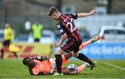 18 June 2021; Jamie Mullins of Bohemians is tackled by Drogheda United goalkeeper David Odumosu during the SSE Airtricity League Premier Division match between Bohemians and Drogheda United at Dalymount Park in Dublin. Photo by Piaras Ó Mídheach/Sportsfile