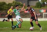 21 June 2021; Dawson Devoy of Bohemians in action against Roberto Lopes of Shamrock Rovers during the SSE Airtricity League Premier Division match between Bohemians and Shamrock Rovers at Dalymount Park in Dublin. Photo by Seb Daly/Sportsfile