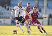 21 June 2021; Chris Shields of Dundalk in action against Mark Doyle of Drogheda United during the SSE Airtricity League Premier Division match between Drogheda United and Dundalk at Head in the Game Park in Drogheda, Louth. Photo by Piaras Ó Mídheach/Sportsfile