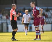 21 June 2021; Mark Doyle of Drogheda United in conversation with referee Graham Kelly during the SSE Airtricity League Premier Division match between Drogheda United and Dundalk at Head in the Game Park in Drogheda, Louth. Photo by Piaras Ó Mídheach/Sportsfile