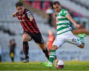 21 June 2021; Graham Burke of Shamrock Rovers in action against Rob Cornwall of Bohemians during the SSE Airtricity League Premier Division match between Bohemians and Shamrock Rovers at Dalymount Park in Dublin. Photo by Seb Daly/Sportsfile