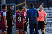 21 June 2021; Referee Graham Kelly in conversation with Drogheda United manager Tim Clancy, back to camera, as Dundalk head coach Vinny Perth, second from left, looks on after the SSE Airtricity League Premier Division match between Drogheda United and Dundalk at Head in the Game Park in Drogheda, Louth. Photo by Piaras Ó Mídheach/Sportsfile