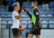21 June 2021; Dundalk players Greg Sloggett, left, and Alessio Abibi bump fists after the SSE Airtricity League Premier Division match between Drogheda United and Dundalk at Head in the Game Park in Drogheda, Louth. Photo by Piaras Ó Mídheach/Sportsfile