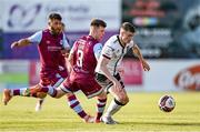 21 June 2021; Daniel Kelly of Dundalk in action against Conor Kane and Gary Deegan, left, of Drogheda United during the SSE Airtricity League Premier Division match between Drogheda United and Dundalk at Head in the Game Park in Drogheda, Louth. Photo by Piaras Ó Mídheach/Sportsfile