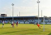 21 June 2021; Drogheda United goalkeeper David Odumosu saves a header from Michael Duffy of Dundalk, second from left, in the lead up to Dundalk's first goal, during the SSE Airtricity League Premier Division match between Drogheda United and Dundalk at Head in the Game Park in Drogheda, Louth. Photo by Piaras Ó Mídheach/Sportsfile