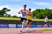 19 June 2021; Gavin Curtin of Donore Harriers, Dublin, left, and Matthew Lavery of North Belfast Harriers, competing in the Junior Men's 5000m during day one of the Irish Life Health Junior Championships & U23 Specific Events at Morton Stadium in Santry, Dublin. Photo by Sam Barnes/Sportsfile