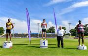 19 June 2021; Athletics Ireland President John Cronin, second from right, with Junior Men's 200m medallists, from left, James Ezeonu of Leevale AC, Cork, silver, Robert McDonnell of Galway City Harriers AC, Galway, gold, Charles Okafor of Mullingar Harriers AC, Westmeath, bronze, during day one of the Irish Life Health Junior Championships & U23 Specific Events at Morton Stadium in Santry, Dublin. Photo by Sam Barnes/Sportsfile