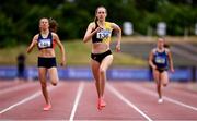 25 June 2021; Cliodhna Manning of Kilkenny City Harriers AC, Kilkenny, on her way to winning her heat whilst competing in the Women's 400m during day one of the Irish Life Health National Senior Championships at Morton Stadium in Santry, Dublin. Photo by Sam Barnes/Sportsfile