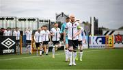 25 June 2021; Dundalk captain Chris Shields leads his side out ahead of playing his final game for the club before the SSE Airtricity League Premier Division match between Dundalk and Derry City at Oriel Park in Dundalk, Louth. Photo by Stephen McCarthy/Sportsfile