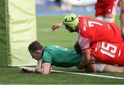 25 June 2021; Cathal Forde of Ireland powers past Jacob Beetham and Harri Deaves of Wales to score the first try during the U20 Six Nations Rugby Championship match between Wales and Ireland at Cardiff Arms Park in Cardiff, Wales. Photo by Gareth Everett/Sportsfile