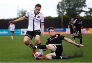 25 June 2021; Raivis Jurkovskis of Dundalk is tackled by Cameron McJannet of Derry City during the SSE Airtricity League Premier Division match between Dundalk and Derry City at Oriel Park in Dundalk, Louth. Photo by Stephen McCarthy/Sportsfile