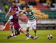 25 June 2021; Graham Burke of Shamrock Rovers in action against Killian Phillips of Drogheda United during the SSE Airtricity League Premier Division match between Shamrock Rovers and Drogheda United at Tallaght Stadium in Dublin. Photo by Seb Daly/Sportsfile