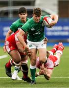 25 June 2021; Tim Corkery of Ireland makes a break during the U20 Six Nations Rugby Championship match between Wales and Ireland at Cardiff Arms Park in Cardiff, Wales. Photo by Gareth Everett/Sportsfile