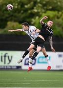 25 June 2021; Raivis Jurkovskis of Dundalk in action against David Parkhouse of Derry City during the SSE Airtricity League Premier Division match between Dundalk and Derry City at Oriel Park in Dundalk, Louth. Photo by Stephen McCarthy/Sportsfile