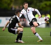 25 June 2021; Patrick McEleney of Dundalk in action against Daniel Lafferty of Derry City during the SSE Airtricity League Premier Division match between Dundalk and Derry City at Oriel Park in Dundalk, Louth. Photo by Stephen McCarthy/Sportsfile