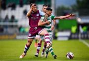 25 June 2021; Danny Mandroiu of Shamrock Rovers in action against Gary Deegan of Drogheda United during the SSE Airtricity League Premier Division match between Shamrock Rovers and Drogheda United at Tallaght Stadium in Dublin. Photo by Seb Daly/Sportsfile