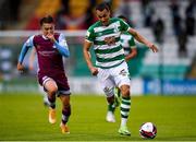 25 June 2021; Graham Burke of Shamrock Rovers in action against Darragh Markey of Drogheda United during the SSE Airtricity League Premier Division match between Shamrock Rovers and Drogheda United at Tallaght Stadium in Dublin. Photo by Seb Daly/Sportsfile