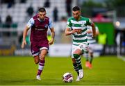 25 June 2021; Danny Mandroiu of Shamrock Rovers in action against Luke Heeney of Drogheda United during the SSE Airtricity League Premier Division match between Shamrock Rovers and Drogheda United at Tallaght Stadium in Dublin. Photo by Seb Daly/Sportsfile