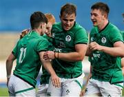 25 June 2021; Chris Cosgrave of Ireland is congratulated by team mates after scoring his side's second try during the U20 Six Nations Rugby Championship match between Wales and Ireland at Cardiff Arms Park in Cardiff, Wales. Photo by Gareth Everett/Sportsfile