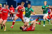 25 June 2021; Ben Moxham of Ireland is tackled by Dan John of Wales during the U20 Six Nations Rugby Championship match between Wales and Ireland at Cardiff Arms Park in Cardiff, Wales. Photo by Gareth Everett/Sportsfile