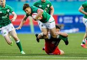 25 June 2021; Tim Corkery of Ireland is tackled by Oliver Burrows of Wales during the U20 Six Nations Rugby Championship match between Wales and Ireland at Cardiff Arms Park in Cardiff, Wales. Photo by Chris Fairweather/Sportsfile