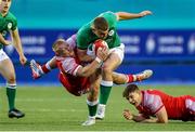 25 June 2021; Ben Moxham of Ireland is tackled by Ioan Evans of Wales during the U20 Six Nations Rugby Championship match between Wales and Ireland at Cardiff Arms Park in Cardiff, Wales. Photo by Chris Fairweather/Sportsfile