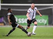 25 June 2021; Chris Shields of Dundalk in action against James Akintunde of Derry City during the SSE Airtricity League Premier Division match between Dundalk and Derry City at Oriel Park in Dundalk, Louth. Photo by Stephen McCarthy/Sportsfile