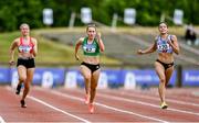 26 June 2021; Niamh Whelan of Ferrybank AC, Waterford,  centre, and Kate Doherty of Dundrum South Dublin AC, right, competing in the Women's 100m heats during day two of the Irish Life Health National Senior Championships at Morton Stadium in Santry, Dublin. Photo by Sam Barnes/Sportsfile