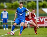 25 June 2021; John Martin of Waterford in action against John Mountney of St Patrick's Athletic during the SSE Airtricity League Premier Division match between Waterford and St Patrick's Athletic at the RSC in Waterford. Photo by Michael P Ryan/Sportsfile