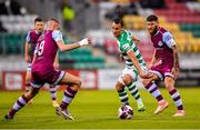 25 June 2021; Graham Burke of Shamrock Rovers in action against Killian Phillips, left, and Gary Deegan of Drogheda United during the SSE Airtricity League Premier Division match between Shamrock Rovers and Drogheda United at Tallaght Stadium in Dublin. Photo by Seb Daly/Sportsfile